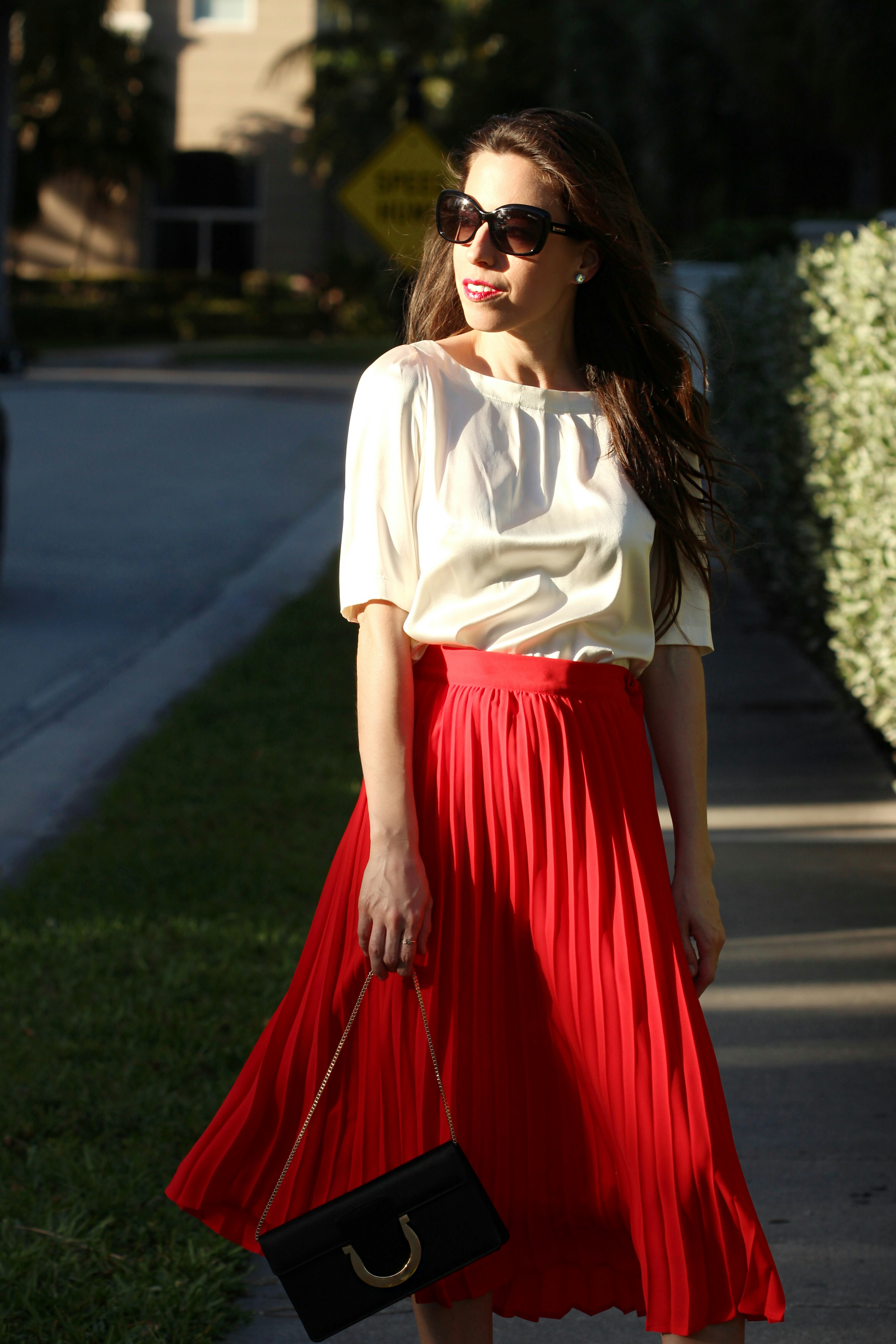 red pleated skirt