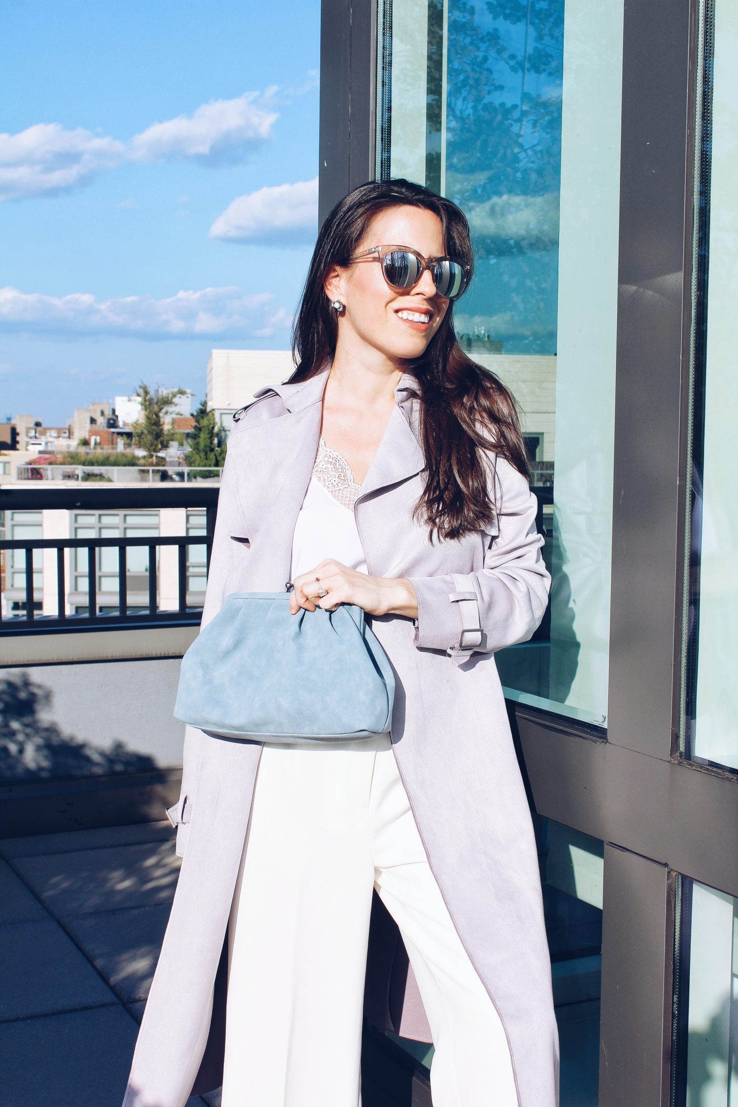 New York fashion blogger Ana Florentina wearing lilac trench coat