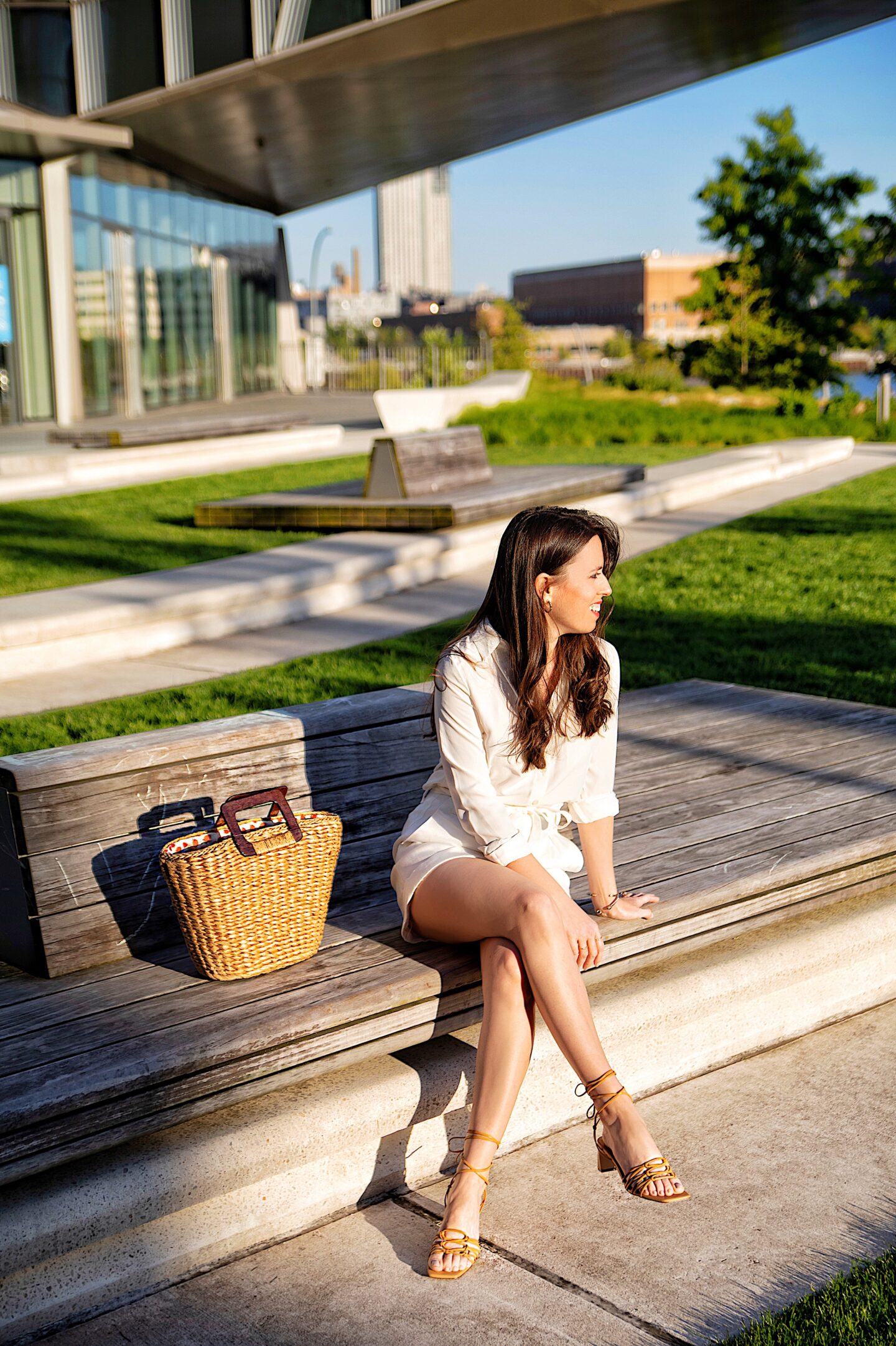 Ana Florentina wearing Ann Taylor lace up sandals and straw bag