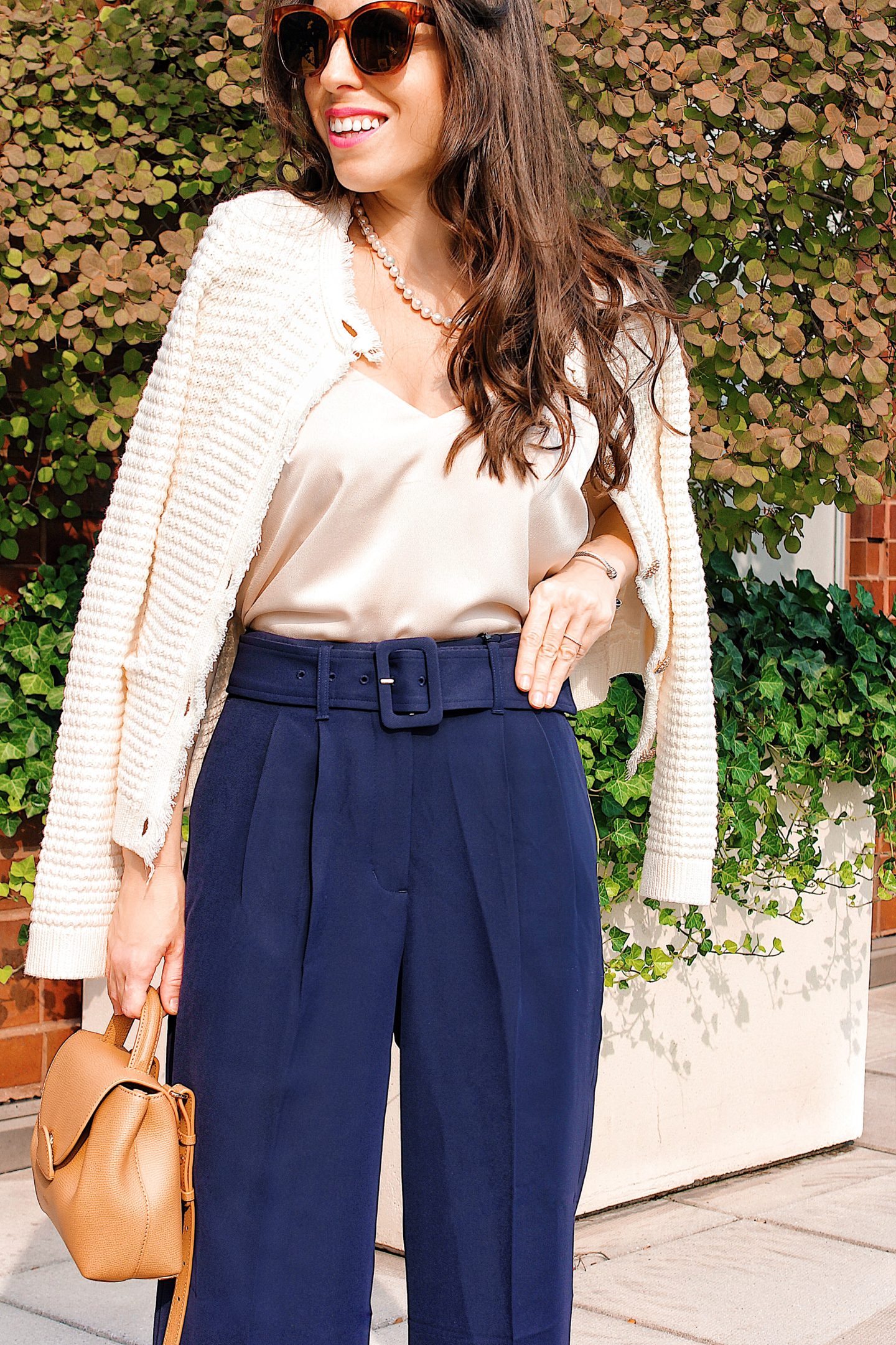 navy pants and sweater jacket